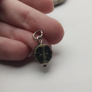 Tribal pattern peace necklace pendant